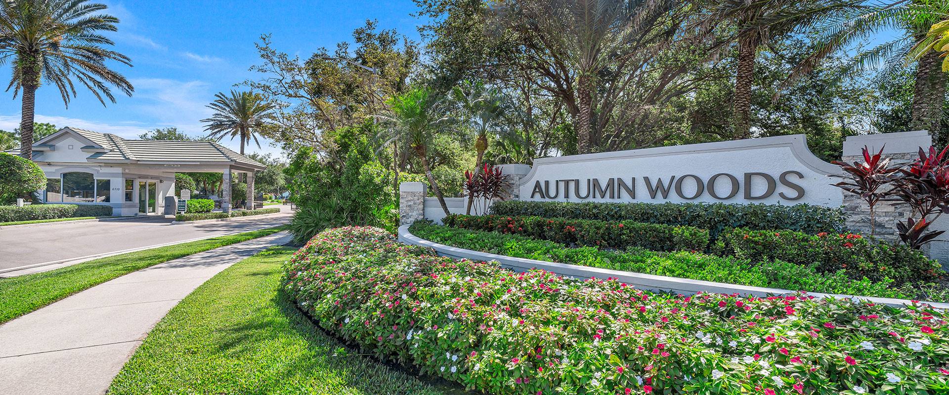 Active adult neighborhood in Naples Florida with palm-lined streets