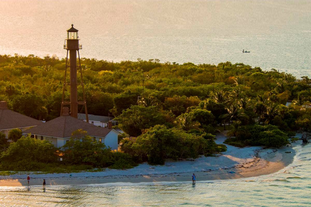 Beach shells on Sanibel Island shore at sunset