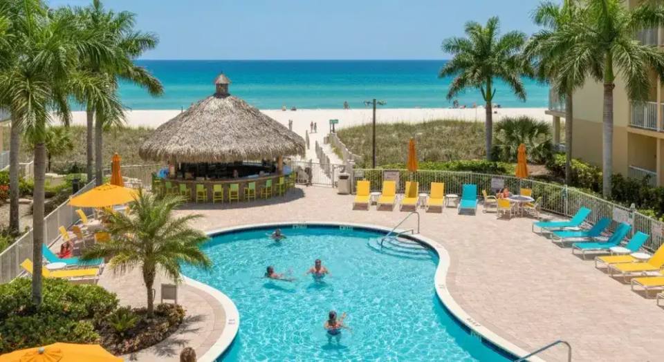 Sanibel Inn colorful resort with pool