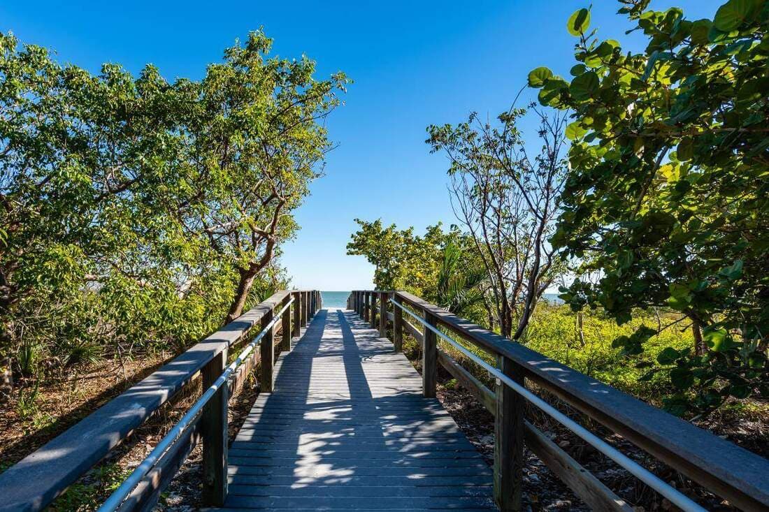 Sanibel Island lighthouse and beach at sunset