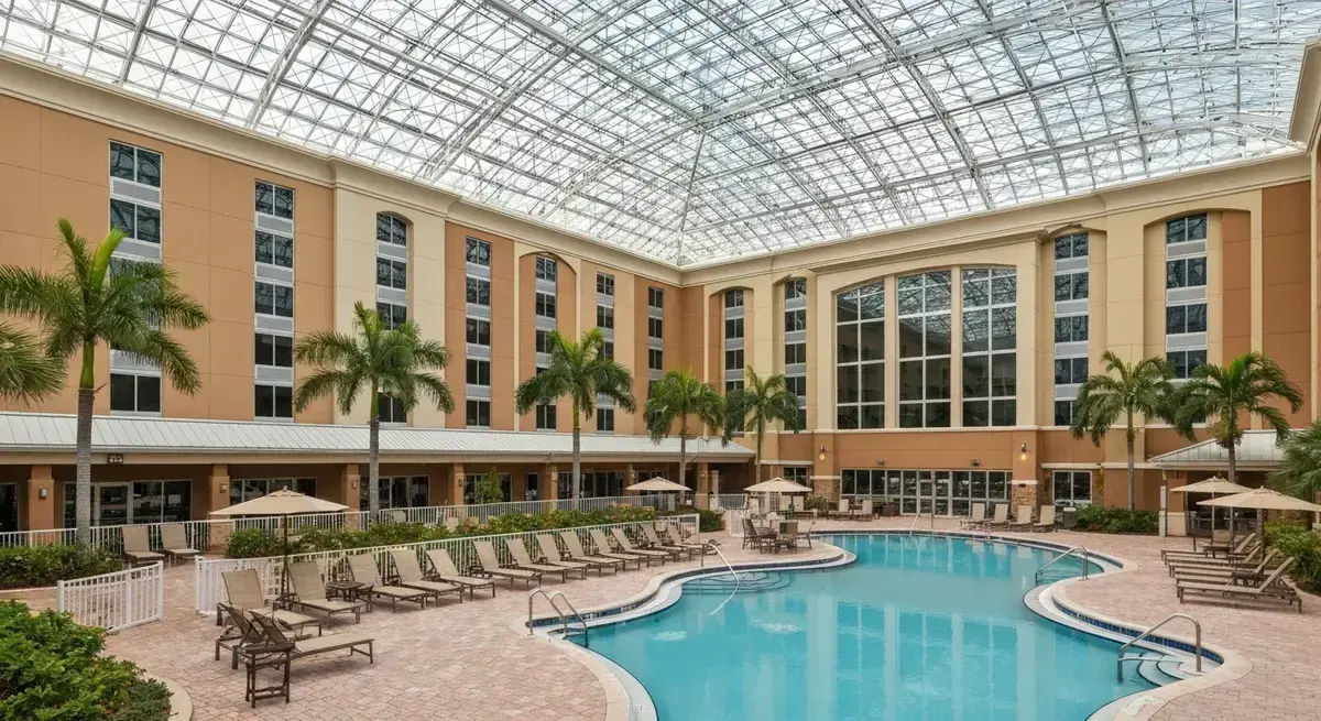 Embassy Suites Fort Myers atrium and pool