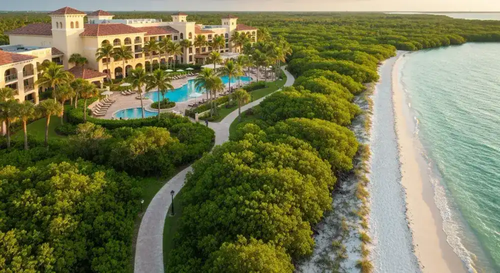 Naples Grande Beach Resort with tropical landscaping